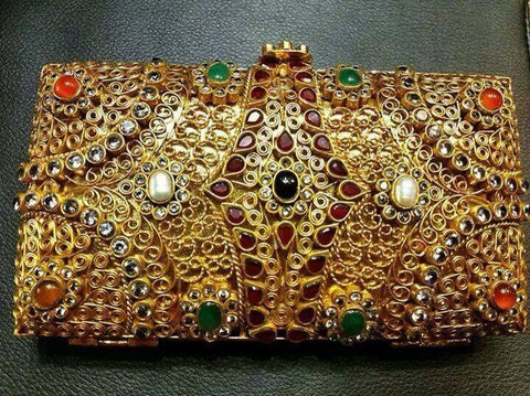 Gold plated clutch.