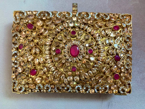 Gold plated clutch.